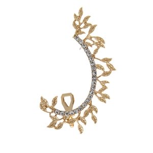 Macro detail of gold leaf ear cuff with sparkling zircons and delicate leaf texture