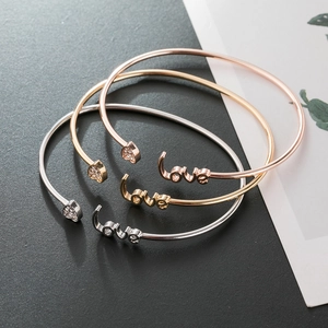Three-piece heart and love open bangle set in gold silver and rose gold finishes