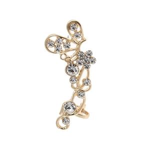 Élégant clip d'oreille papillon doré avec strass et design d'ailes ajourées