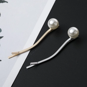 Elegant gold and silver wave hair clips with large white pearls for women's hair styling