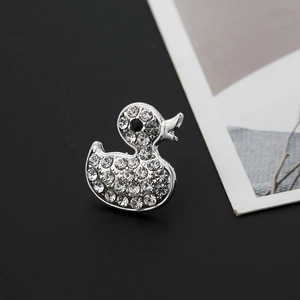 Charming duck brooch in silver alloy with sparkling crystal rhinestones and black eye detail