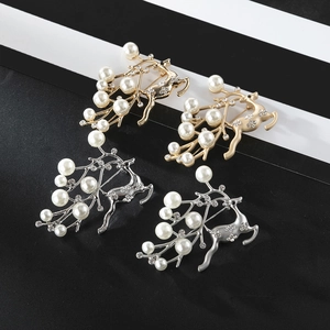 Classic deer shaped brooches with rhinestones and pearls in gold and silver finishes
