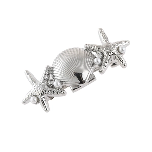 Starfish and seashell hair clip with silver alloy, white pearls and sparkling rhinestones
