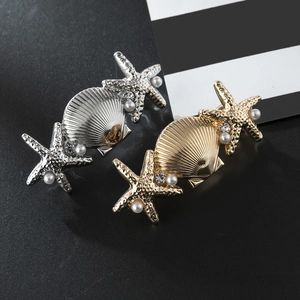 Starfish and seashell hair clips in gold and silver with pearls and rhinestones