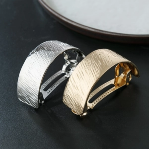 Textured metallic arched ponytail hair clip set in gold and silver finish for women