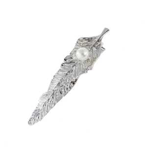 Silver feather hair clip with white pearl detail for women on white background