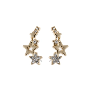 Macro detail of golden star stud earrings featuring sparkling rhinestones in an arc