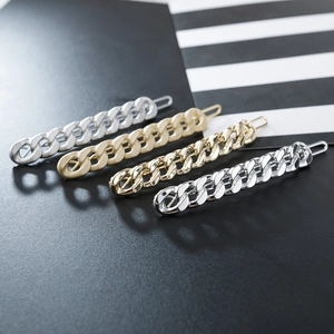 Set of four alloy chain hair clips in matte gold, matte silver, and shiny silver finishes