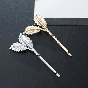 Minimalist alloy leaf hair pins in gold and silver finish with detailed leaf veins
