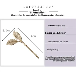 Detailed view of leaf-shaped alloy hair clip showing 6x2.3cm dimensions and golden finish