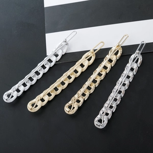 Set of 4 metallic chain link hair clips in silver, gold, and chrome finishes