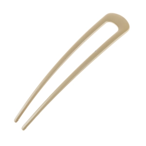 Détail d'épingle à cheveux en U beige minimaliste avec finition polie pour coiffure chic