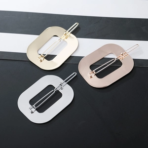 Three minimalist geometric hollow hair clips in gold, silver and rose gold finishes