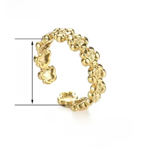Detailed top view of 14K gold minimalist open flower ring showing 17mm inner diameter