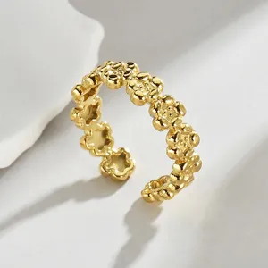 Elegant 14K gold minimalist open ring featuring a continuous floral petal design for women