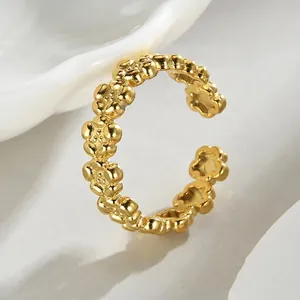 Minimalist 14K gold plated open ring featuring a delicate embossed floral pattern