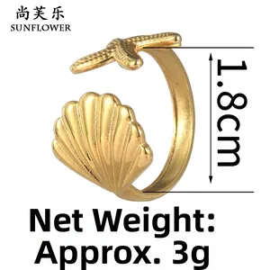Detailed view of gold sea shell and starfish ring showing 1.8cm diameter and 3g weight