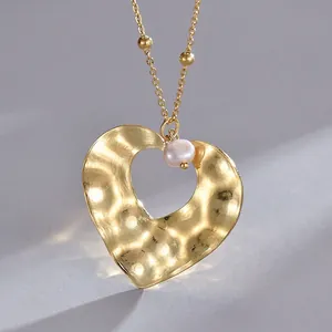 French ethnic style hollow heart pendant necklace with pearl and gold beads