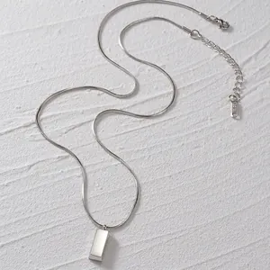 Minimalist silver stainless steel snake chain necklace with rectangular brick pendant