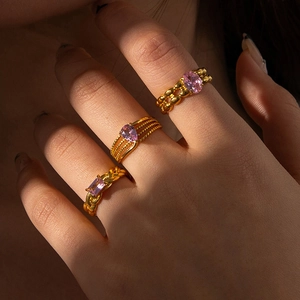 Vintage gold-plated stainless steel rings featuring pink zircon stones in various cuts