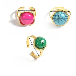 Detailed view of vintage gemstone rings showing specific inner diameters and weights