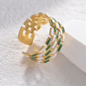 Vintage style gold hollow woven ring with green and white enamel rectangular mosaic design