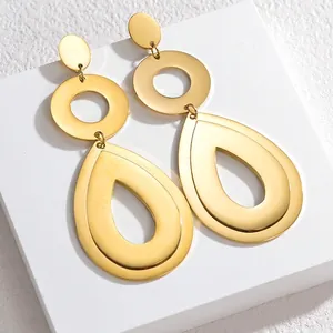 Boucles d'oreilles géométriques longues avec pendentif goutte d'eau creuse en fini doré