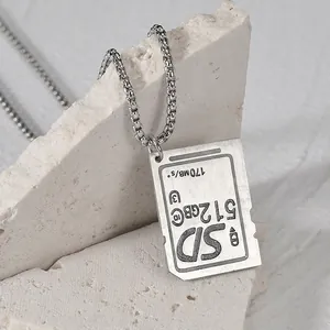 Minimalist stainless steel SD card pendant necklace with brushed metallic texture and bead chain