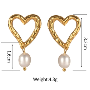 Detailed view of heart-shaped gold textured earrings with dimensions 3.2cm and 4.3g weight
