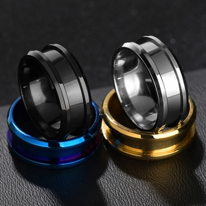 Minimalist 8mm stainless steel grooved rings in black, silver, blue, and gold finishes
