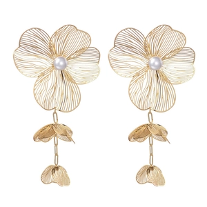 Elegant gold mesh flower tassel earrings with pearls on a clean white background