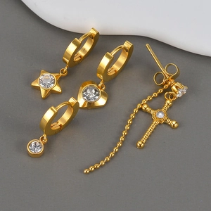 Set of four French vintage 18K gold-plated earrings featuring heart, star and cross charms