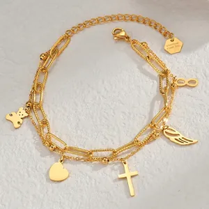 Detail view of 18K gold double-layer stainless steel bracelet with diverse fashion charms