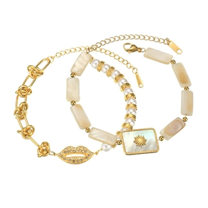 Elegant two-piece gold chain bracelet set with pearl beads and shell sun pendant