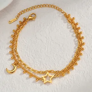 Double-layered 18K gold plated stainless steel bracelet with star and moon charms