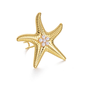Exaggerated gold starfish open ring with pearl accents and textured metal finish