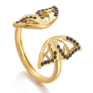 Detailed view of gold butterfly open ring featuring intricate black cubic zirconia stones