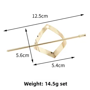 Detailed view of golden geometric hair pin set with hollow metal base and dimensions
