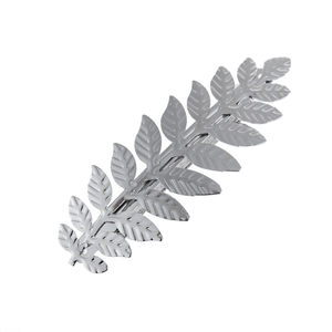 Polished silver leaf-shaped metal hair clip with detailed leaf texture on white background