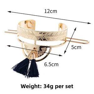 Detail of vintage gold fan-shaped hair clip with dimensions and blue tassels