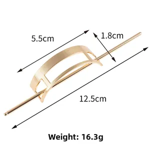 Detail view of gold rectangular hollow hair pin set with dimensional measurements