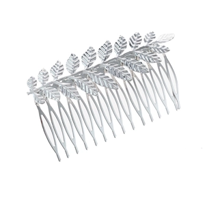 Silver metallic leaf hair comb with detailed foliage texture for wedding hair styling