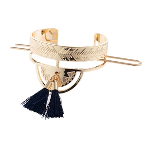 Vintage gold hollow fan-shaped hair pin with deep blue tassels and geometric patterns