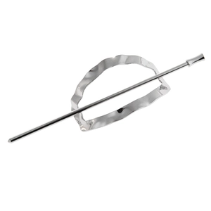 Detailed close-up of a silver irregular oval hollow hair cuff with a matching straight pin