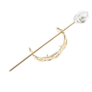 Elegant gold metal hair pin featuring a large baroque pearl and irregular lava texture