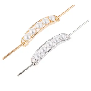 Eleganti forcine in lega oro e argento con perle bianche e montatura ovale ritagliata