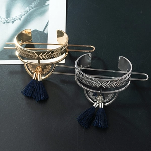 Vintage fan-shaped hairpins with navy blue tassels and wave pattern in gold and silver