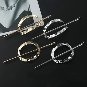 Gold and silver minimalist hollow oval and wavy metal hair sticks in a modern set
