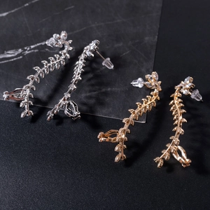 Polished gold and silver leaf vine ear cuffs with sparkling crystals for a trendy look