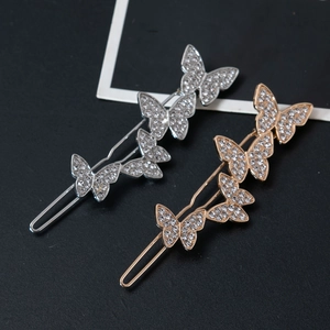 Minimalistisches Schmetterlings-Haarspangen-Set mit funkelnden Strasssteinen in Gold und Silber